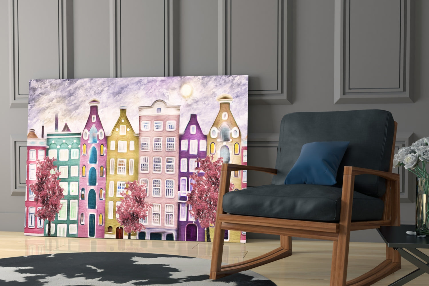 Colorful glass panel featuring whimsical painted townhouses in pink, yellow, and purple with blooming trees, displayed in modern living room setting.