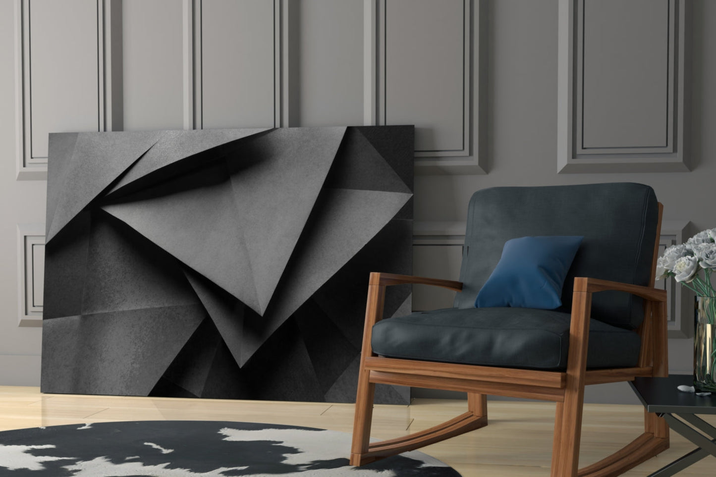 Modern living room interior featuring abstract geometric glass wall art with black and gray folded shapes, wooden armchair with dark upholstery, and paneled wall backdrop.
