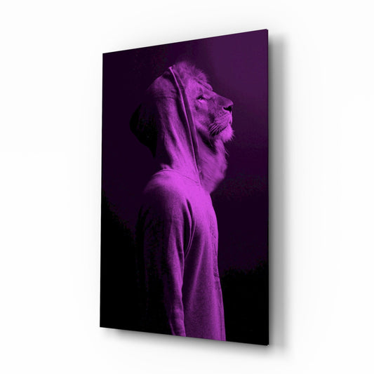 Lion's head in profile wearing a purple hoodie, glowing against dark background on glass wall panel.