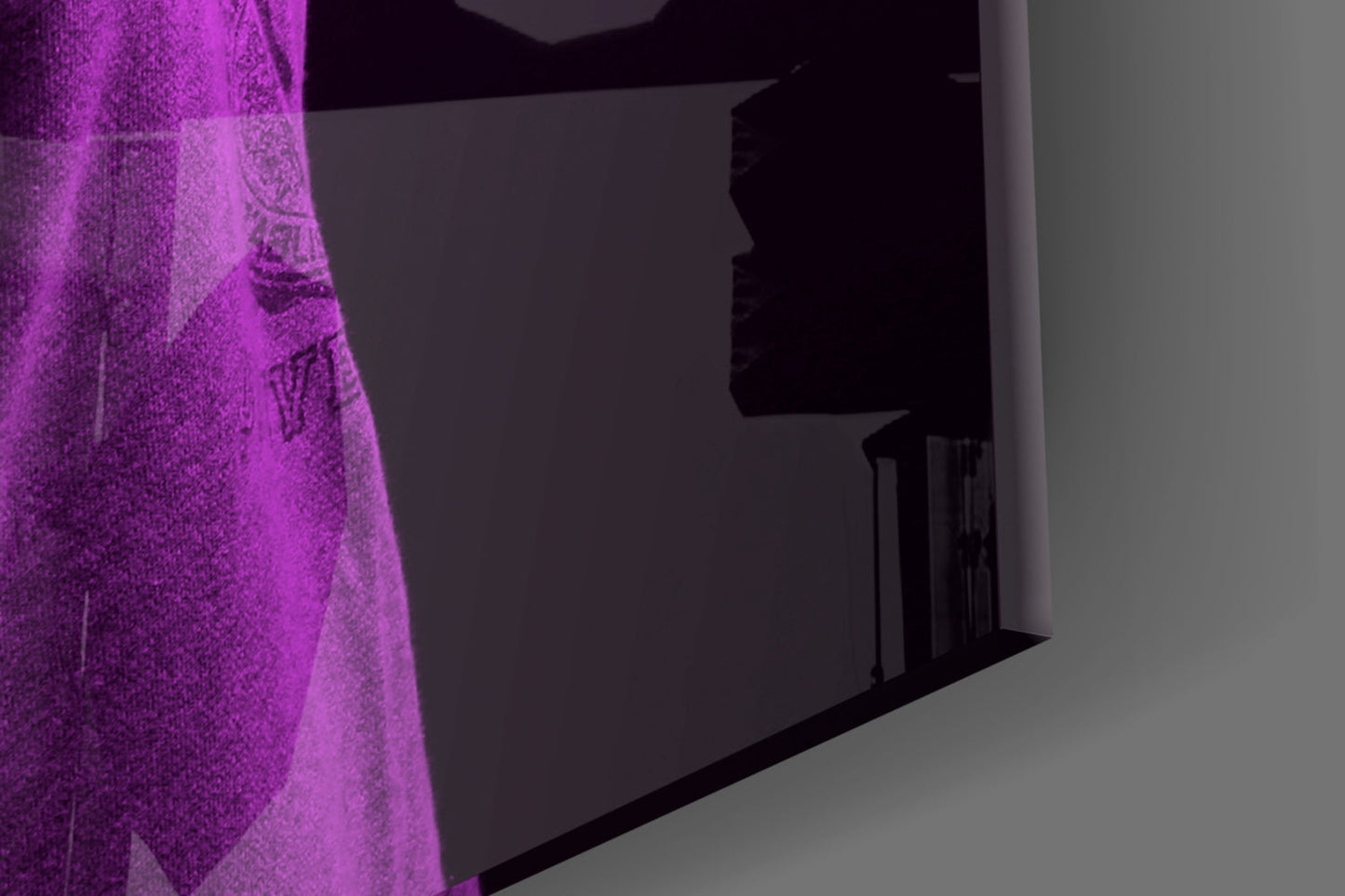 Purple lion head glass wall art mounted on gray wall, illuminated by magenta lighting from left side.