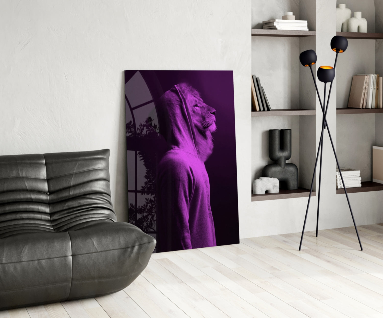 Purple neon lion head glass wall art leaning against white wall in modern living room with gray sofa and shelving.
