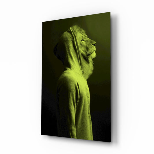 Lion's head in profile wearing a neon lime-green hoodie against dark background on glass panel.