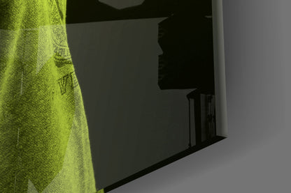 Green textured glass wall art featuring a lion head profile displayed in an interior corner setting.