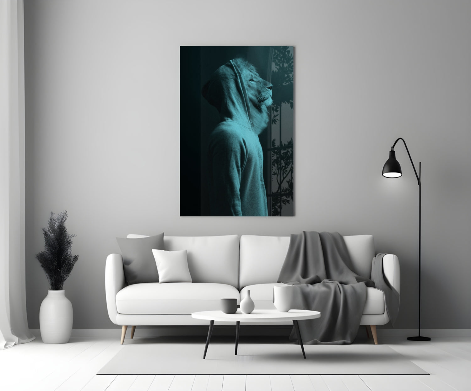 Blue-toned glass wall art depicting a lion's head in profile, displayed above a white sofa in a minimalist living room setting.