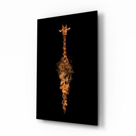 Black glass wall art panel displaying an orange giraffe figure emerging from swirling flame effects against dark background, angled perspective view.