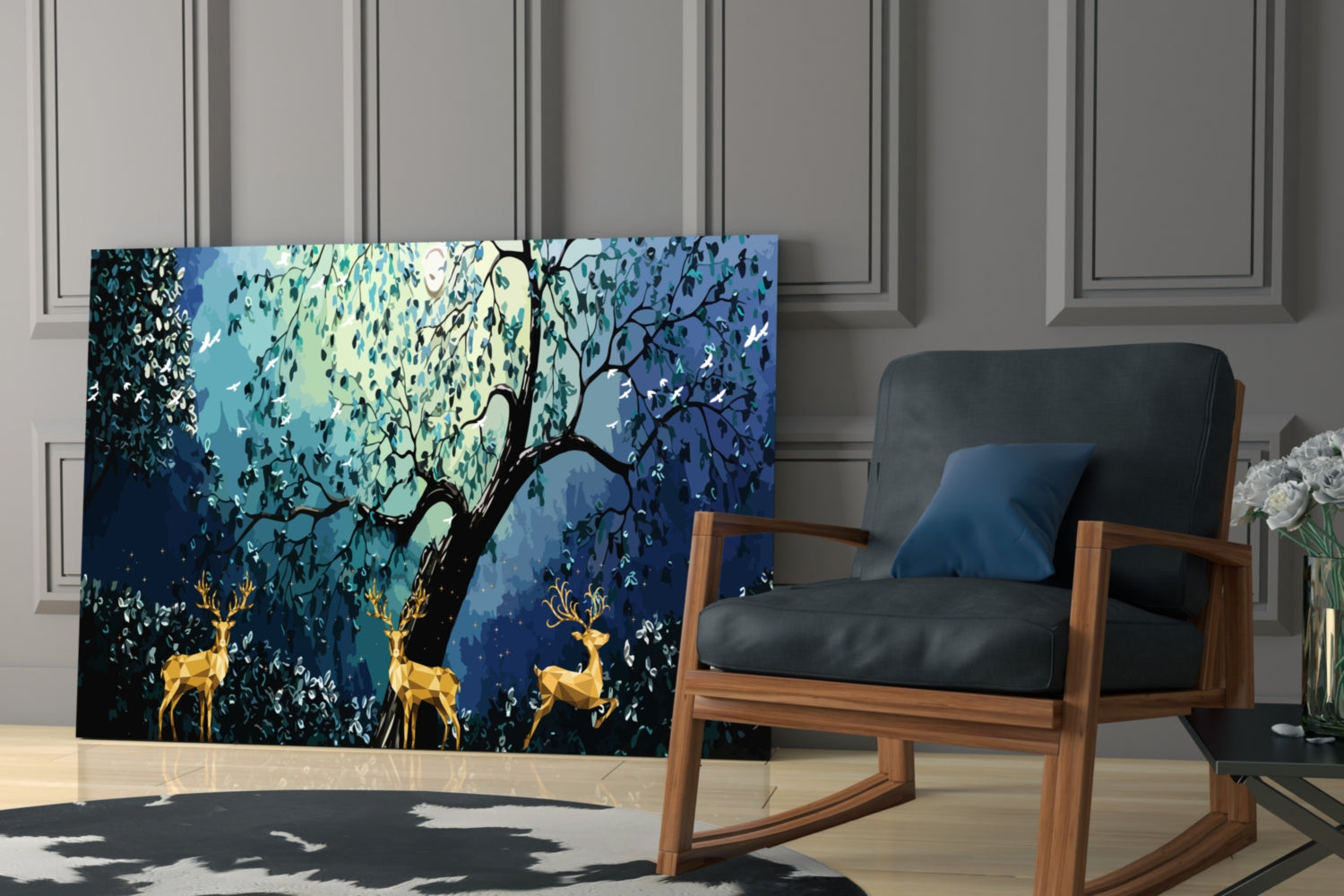 Glass wall art depicting golden deer beneath a willow tree against blue gradient background, displayed in modern interior setting.