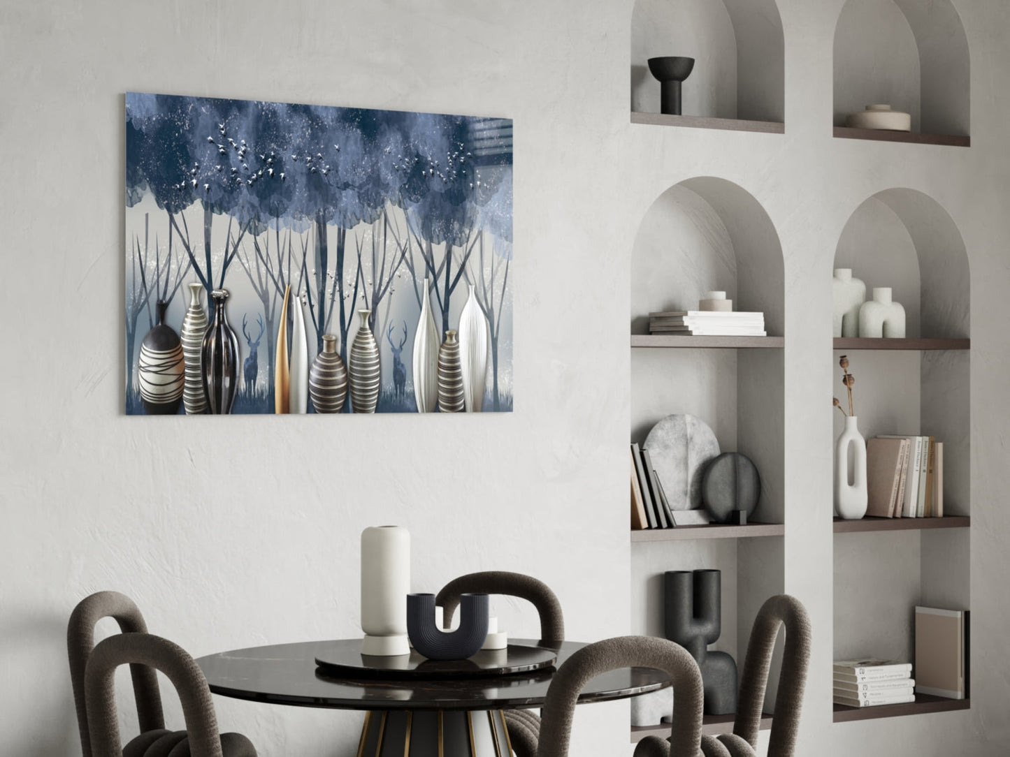 Blue and white glass wall art depicting decorative vases with tall grasses displayed above a black dining table.