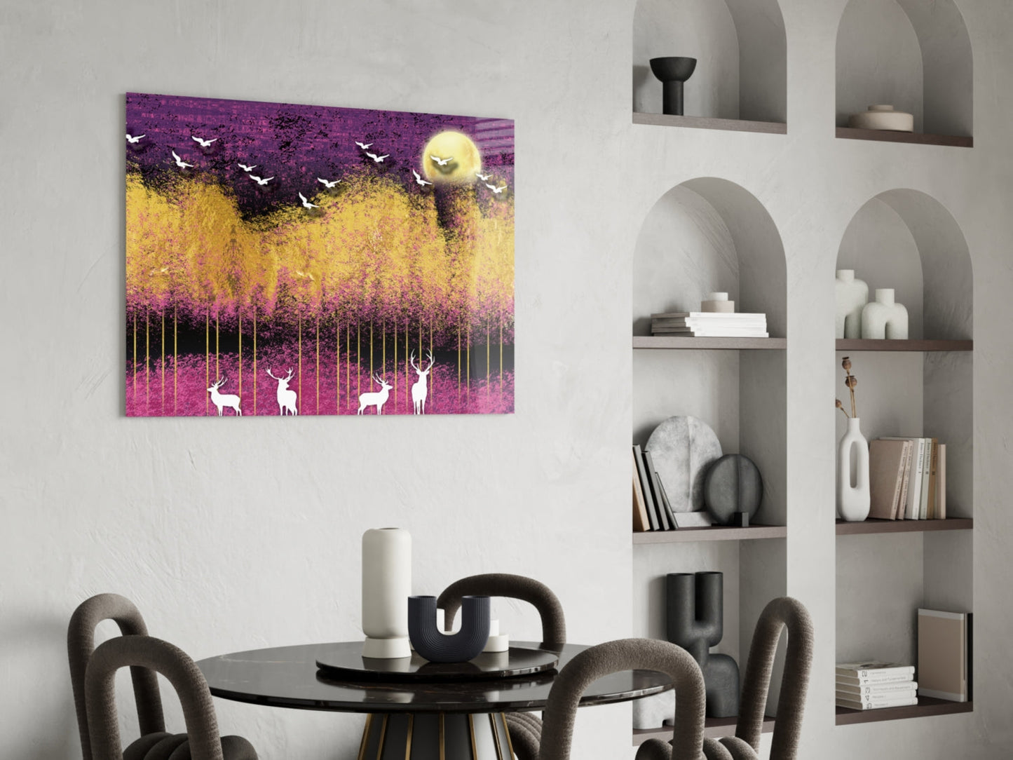 Colorful glass wall art with purple, yellow, and pink landscape featuring white deer and flying birds above a modern dining table.