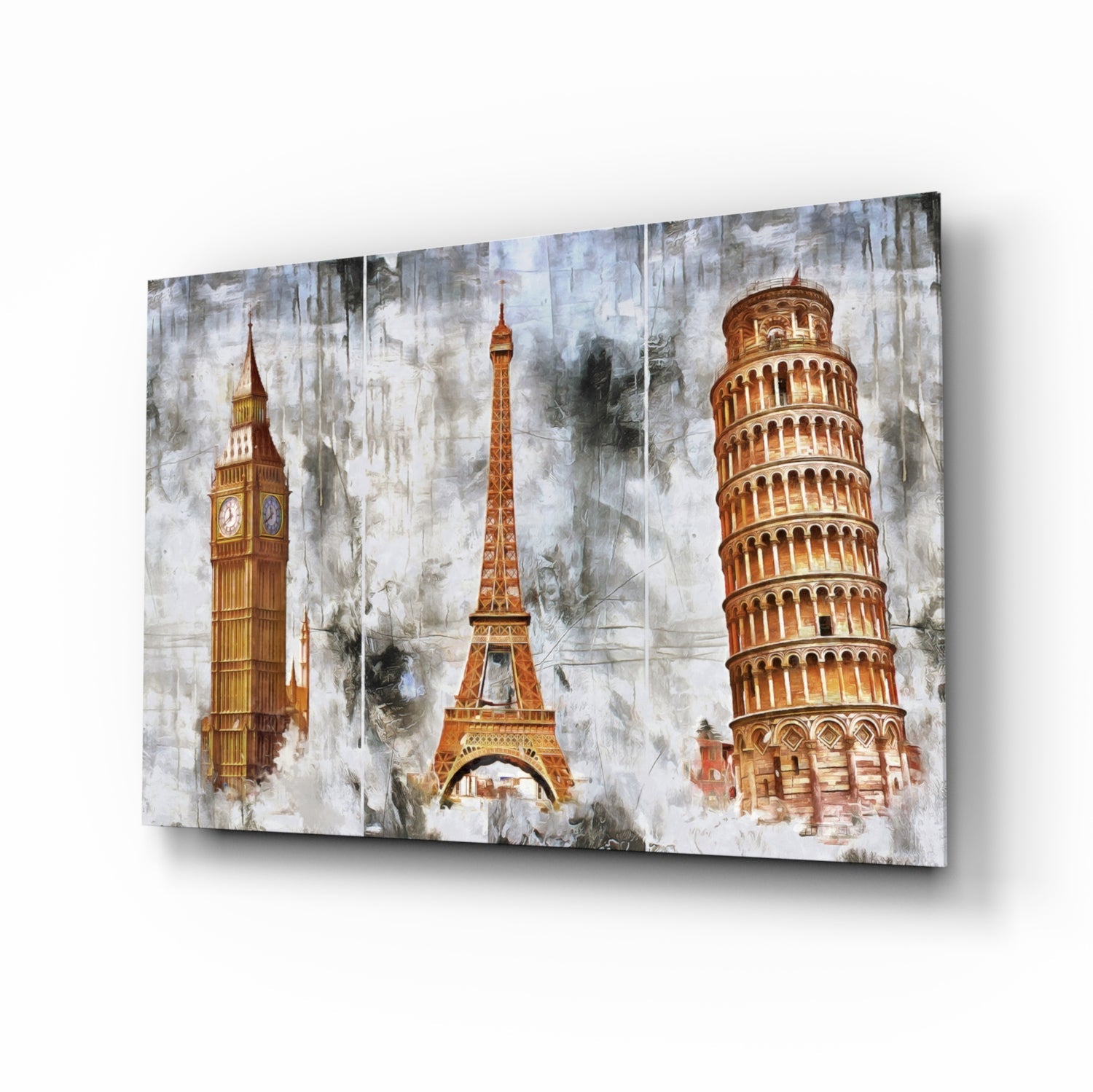 Glass wall art displaying Big Ben, Eiffel Tower, and Leaning Tower of Pisa in golden tones on weathered white background.