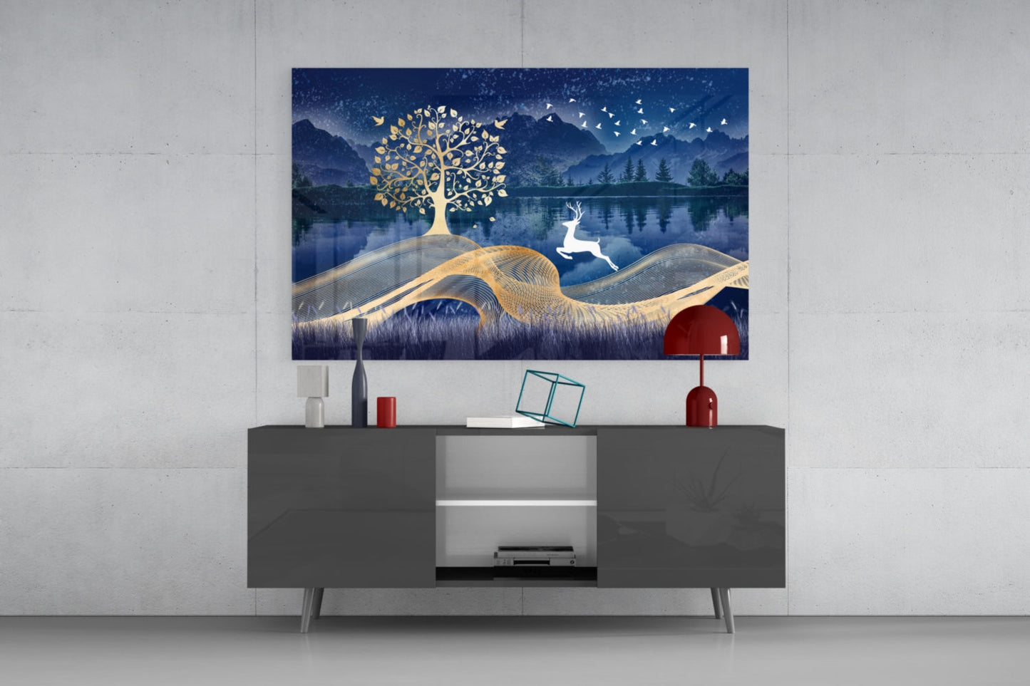 Magic Deer Glass Wall Art displayed above gray media console showing gold tree, deer, and blue nighttime landscape with mountains and lake.