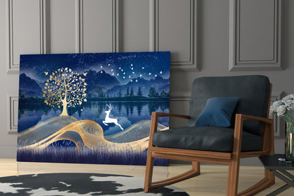 Magic Deer Glass Wall Art displayed in a modern living room beside a wooden chair, featuring gold tree and white deer on deep blue landscape background.