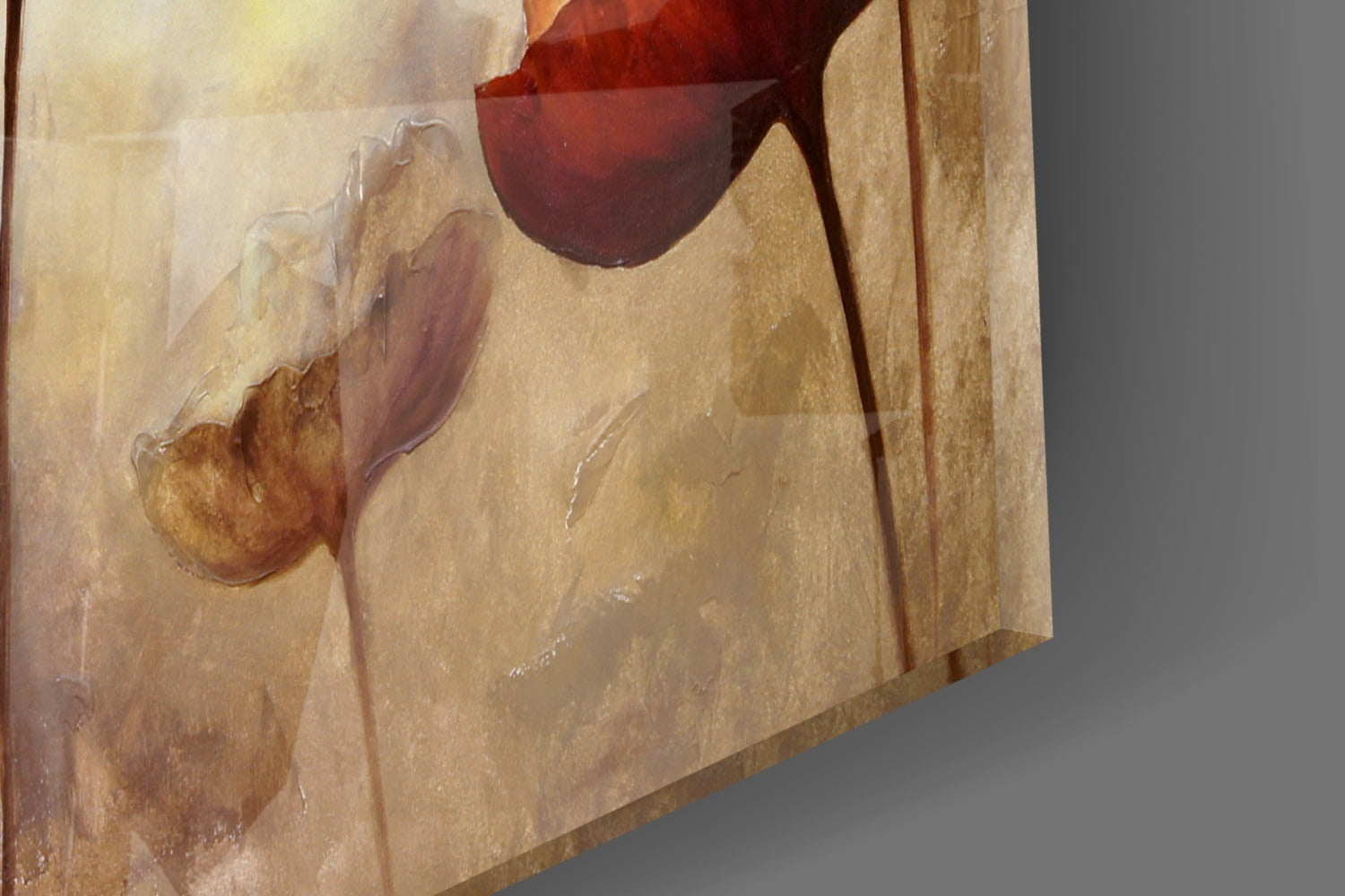 Close-up side view of poppy glass wall art showing deep red glass flower against textured beige and tan fabric backdrop.