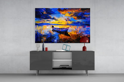 Dark blue sunset glass wall art displaying a vibrant boat scene mounted above a gray media console in a modern living room setting.