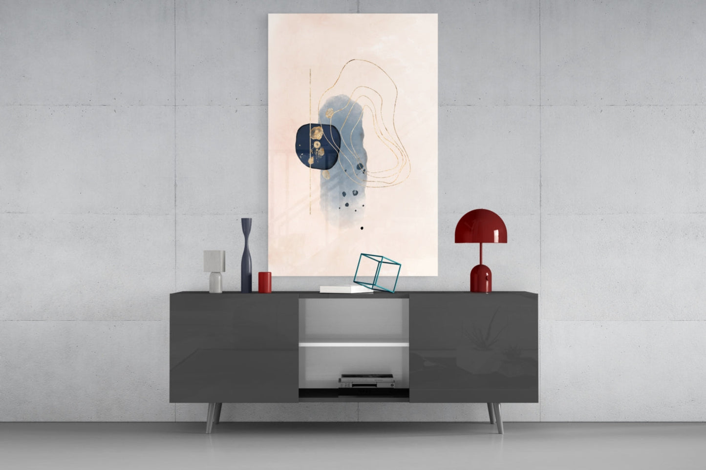 Abstract beige glass wall art with blue, navy, and gold tones displayed above a dark console table in modern interior setting.