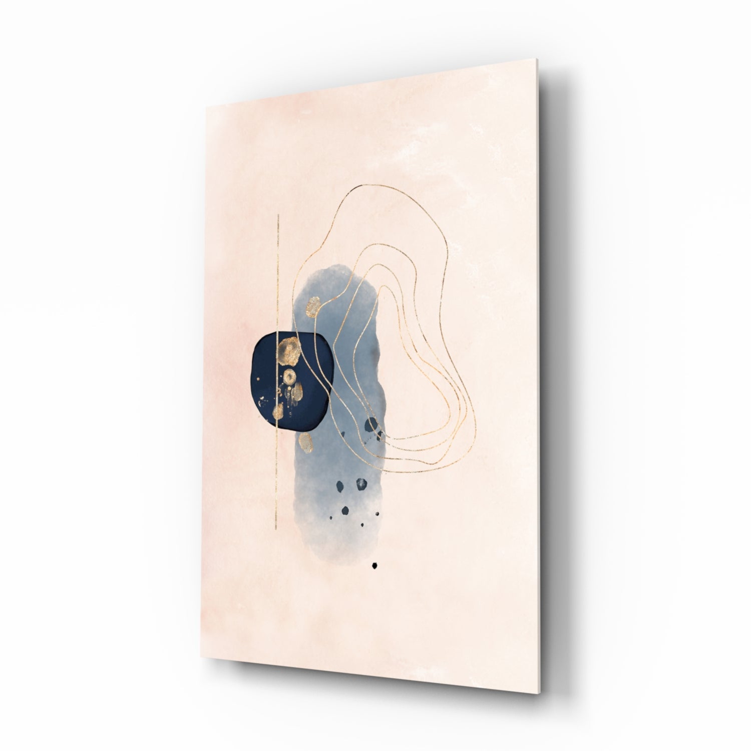 Angled view of beige glass wall art featuring blue watercolor shapes, gold accents, line drawings, and black dots on cream background.