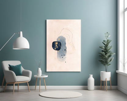 Abstract beige glass wall art displayed on teal wall above white chair in modern living room setting.