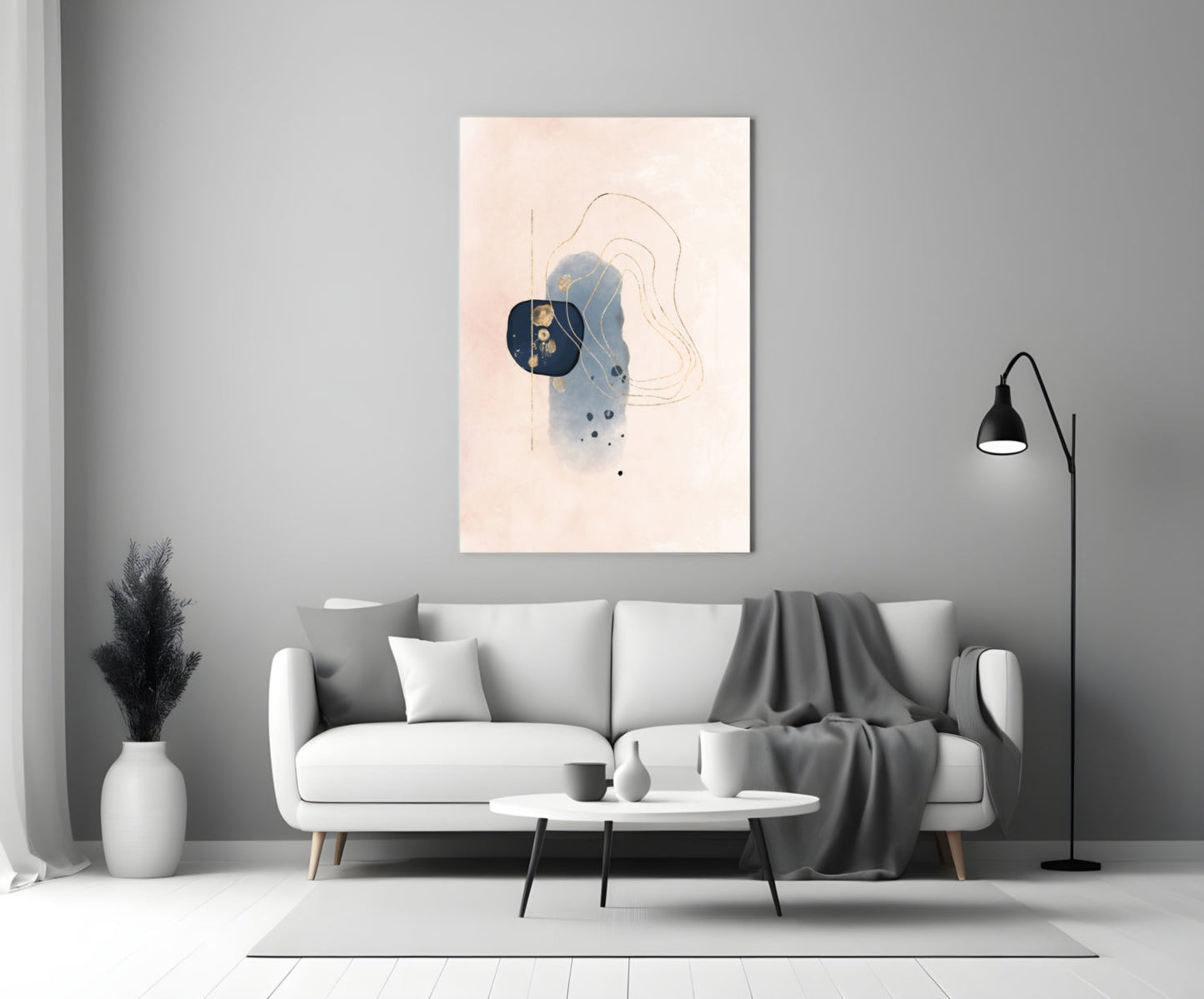 Abstract beige glass wall art with blue watercolor and line drawings displayed above a white sofa in a modern living room.