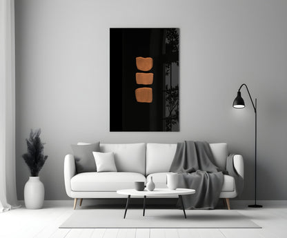 Abstract Column Glass Wall Art with three stacked copper-toned rectangles displayed above a white sofa in modern living room setting.