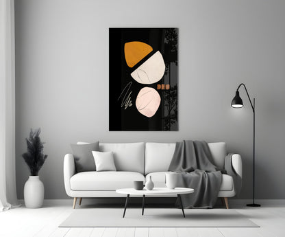 Abstract Acorn Glass Wall Art displayed above white sofa in minimalist living room with black and gold geometric design.