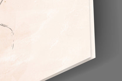 Close-up angled view of frosted glass surface with minimal line etchings against neutral background.