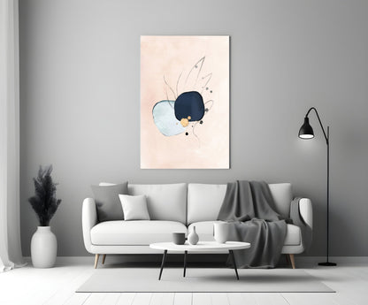 Abstract hand glass wall art with navy, light blue, and peach tones displayed above white sofa in modern living room.
