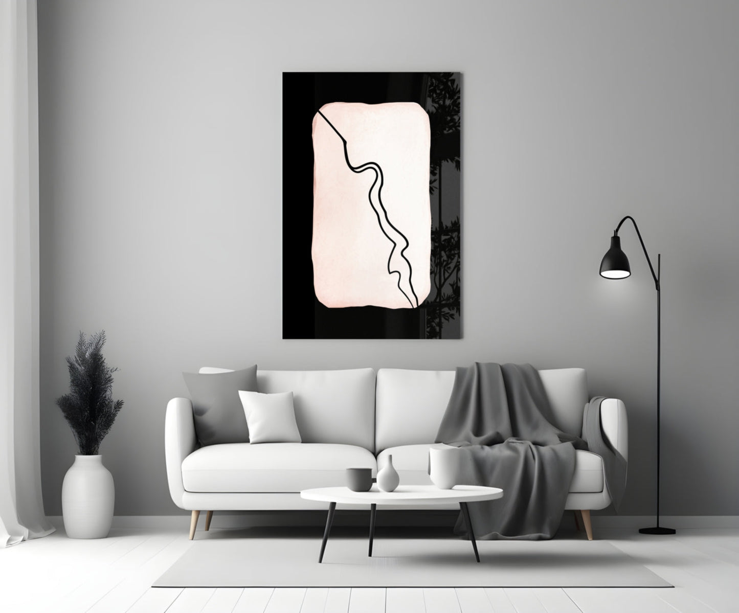 Abstract Distinction Glass Wall Art displayed above a white sofa in a minimalist living room interior.