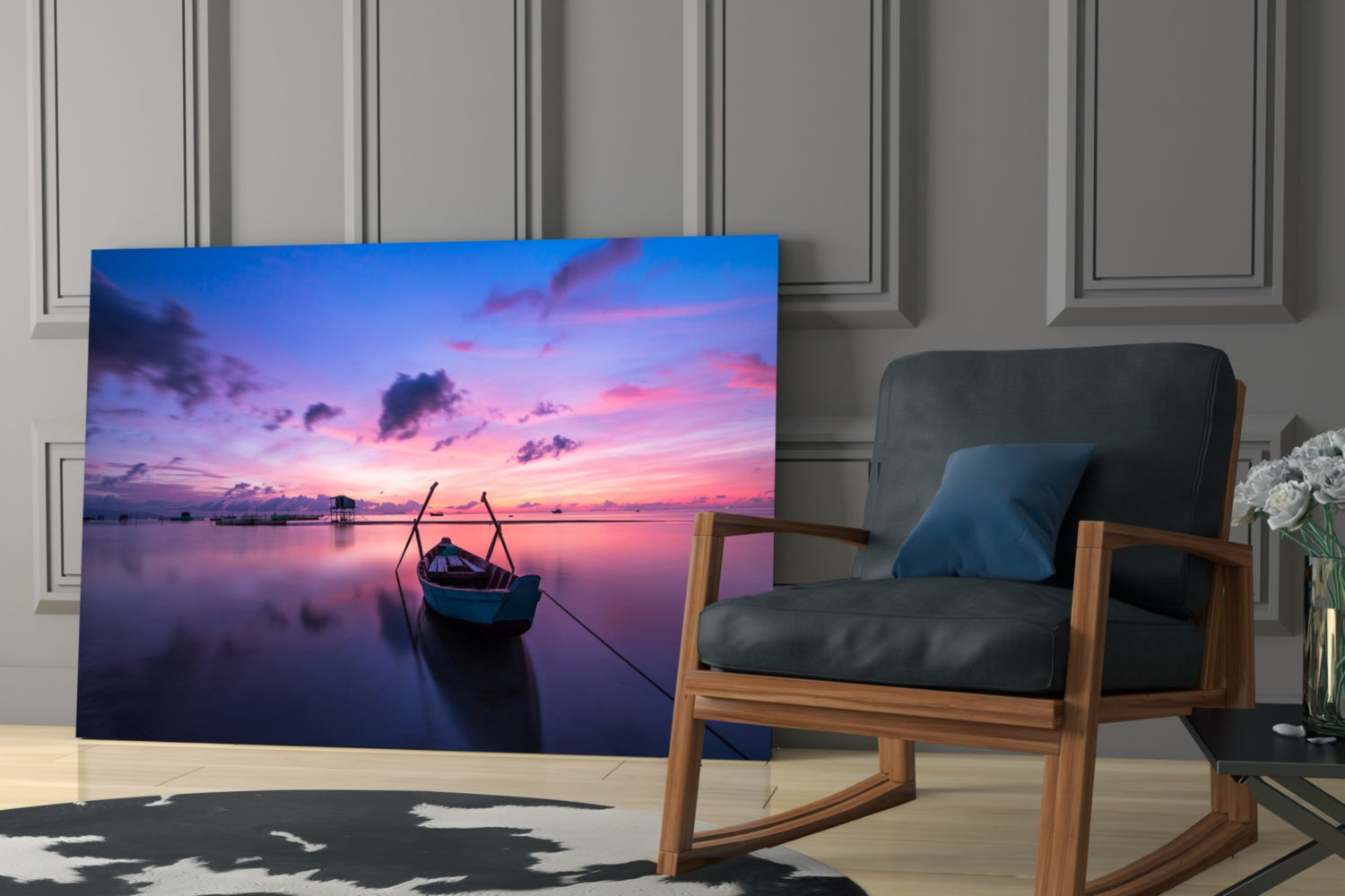 Glass wall art displaying a serene sunset over calm water with a moored boat, displayed in a modern living room setting next to a wooden chair.