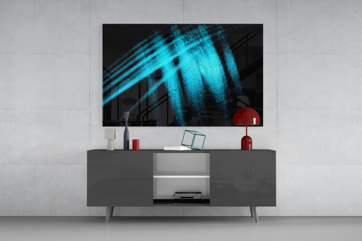 Blue Lights Glass Wall Art displayed on dark gray media console with red decorative objects and white shelving in modern living room setting.