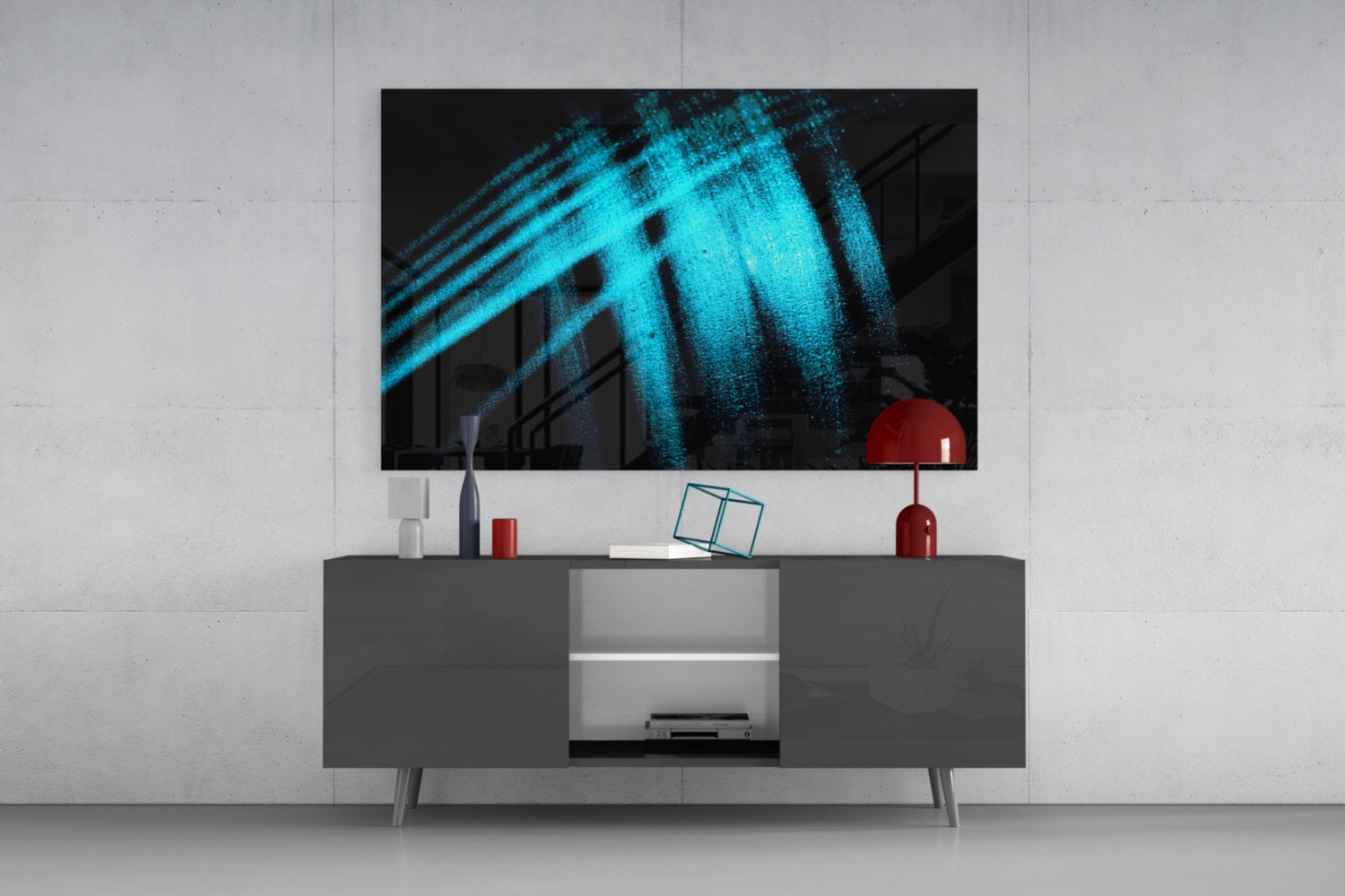 Blue Lights Glass Wall Art displayed on dark gray media console with red decorative objects and white shelving in modern living room setting.