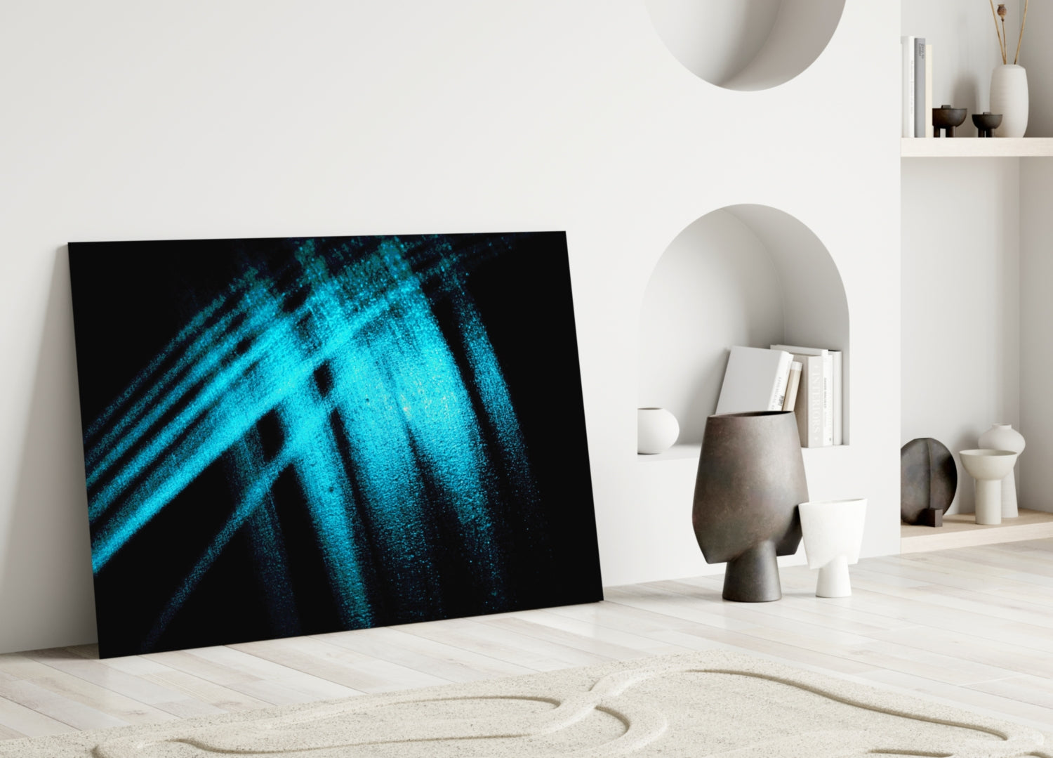 Blue Lights Glass Wall Art leaning against white wall in minimalist room with shelving and decorative objects.