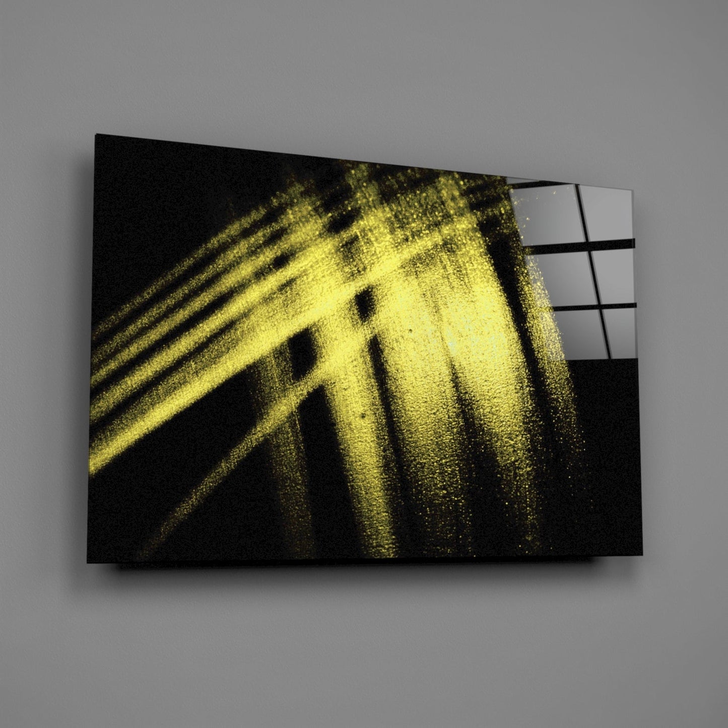 Modern glass wall art featuring yellow light streaks and geometric window patterns against a dark textured background, displayed at an angled perspective.
