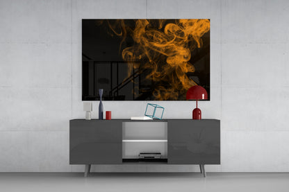 Orange Smoke Glass Wall Art mounted above gray media console with red accents in modern interior setting.