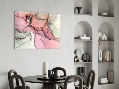 Pink and cream marbled glass wall art hung above a black dining table in a modern interior with built-in shelving.