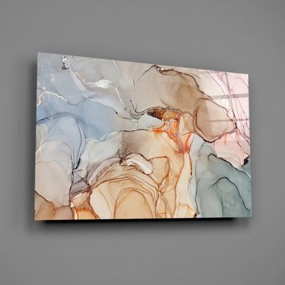 Horizontal glass wall art panel displaying swirled marble patterns in soft blues, pinks, oranges, and earth tones, mounted on gray wall.