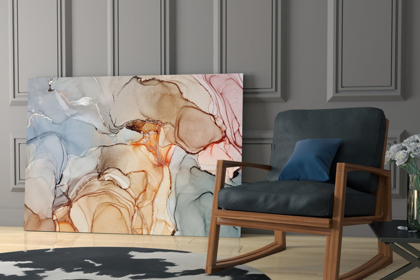 Abstract glass wall art with flowing marble patterns in cream, tan, orange, and pink tones displayed in modern living room setting.