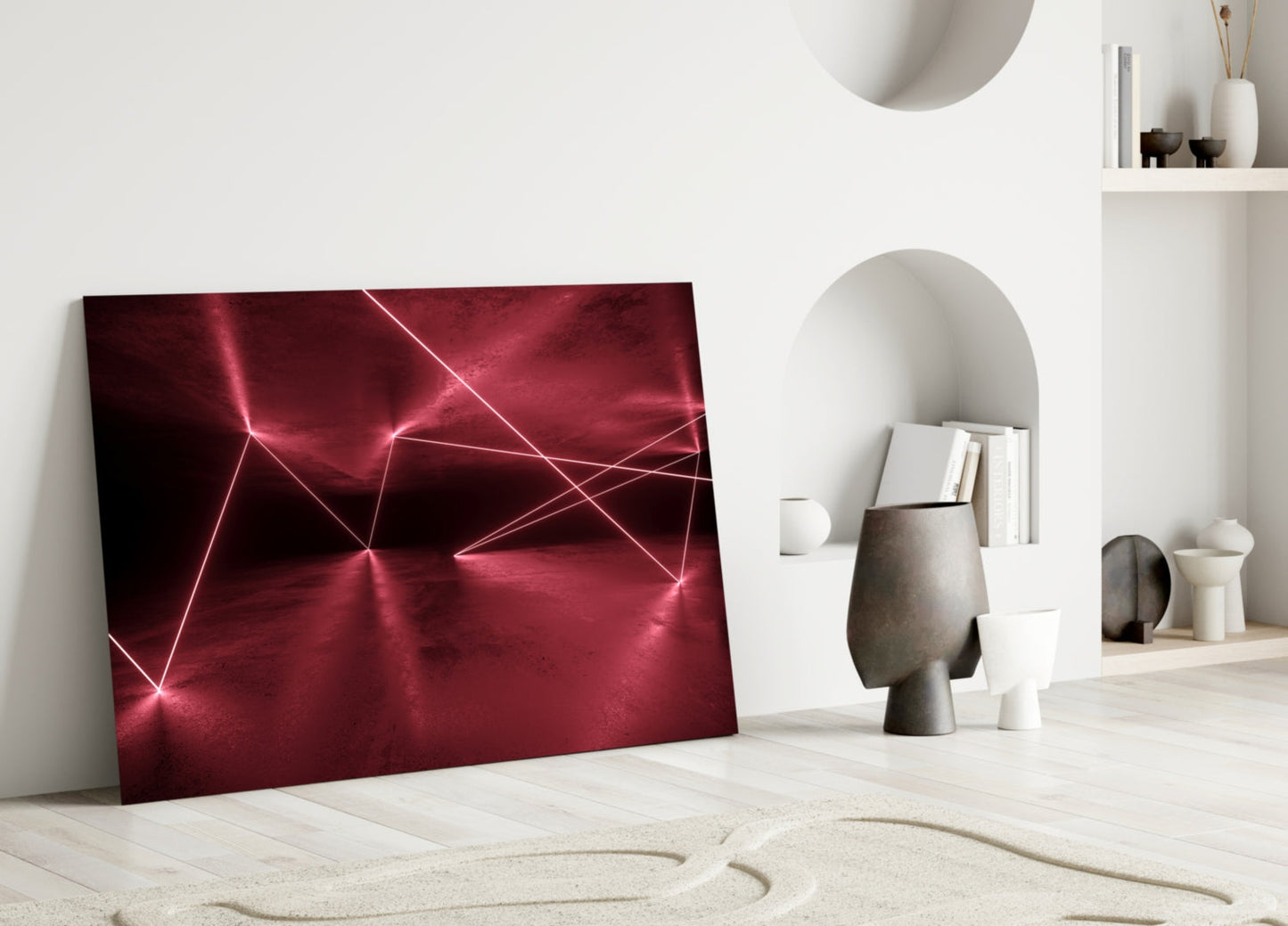Deep crimson glass panel with glowing pink geometric line patterns leaning against white wall in minimalist interior.