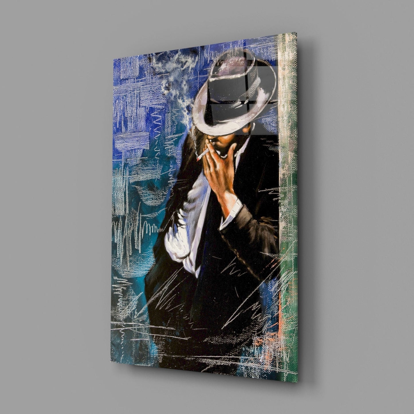 Angled product view of glass wall art depicting a man in a suit and white fedora smoking a cigar, with blue and green digital texture overlay.