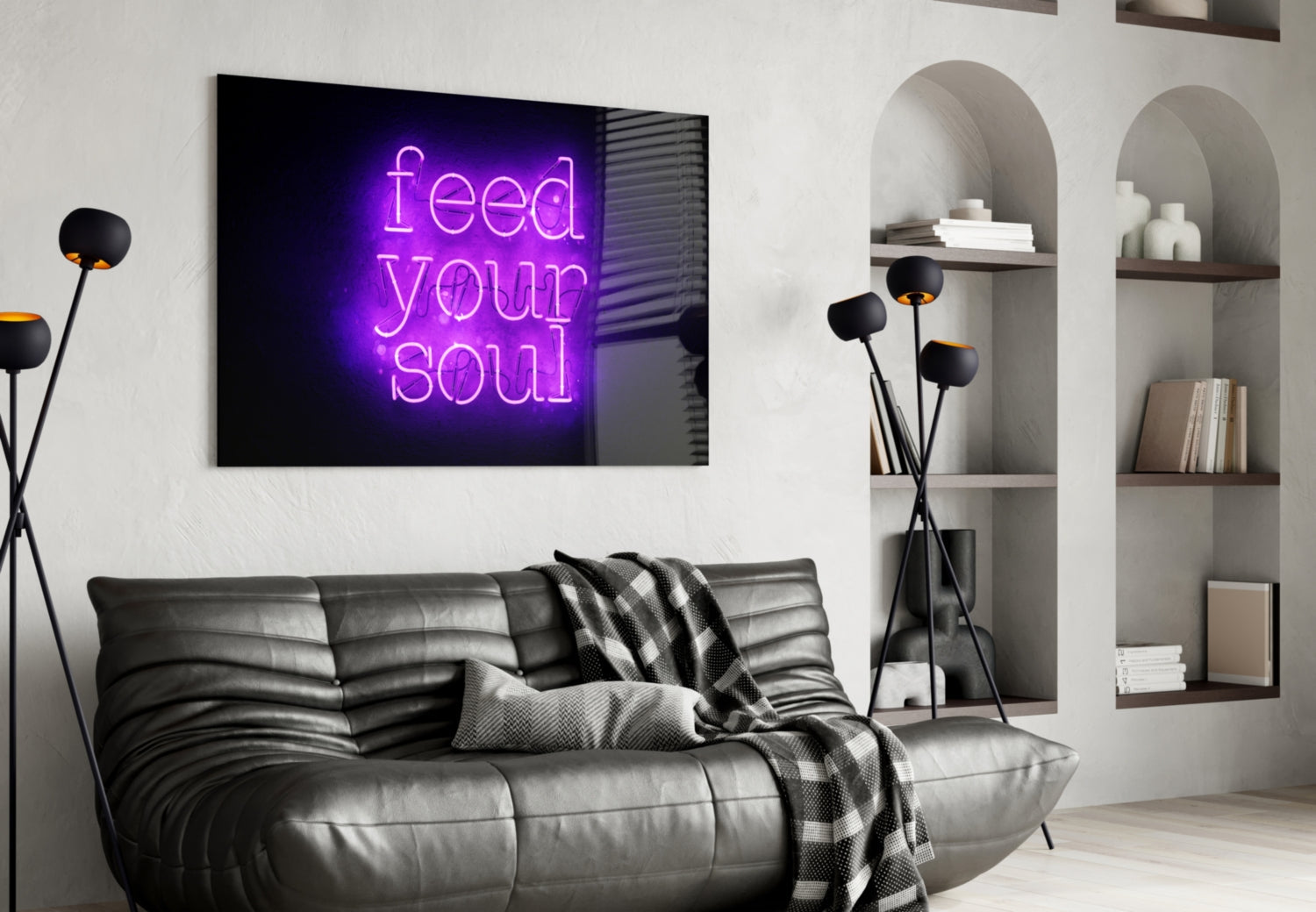 Purple neon "Feed Your Soul" glass wall art displayed above gray leather sofa in modern living room interior.