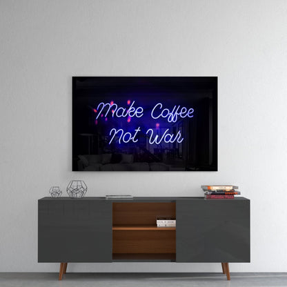 Neon glass wall art displaying "Make Coffee Not War" in blue and pink lettering mounted above a mid-century modern console table in a living room setting.