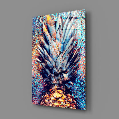 Angled perspective of pineapple glass wall art displaying vibrant turquoise, gold, and deep blue glitter background with metallic fruit detail.