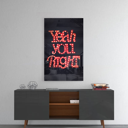 Red neon "Yeah you right" glass wall art displayed above a mid-century modern console table with geometric decor.