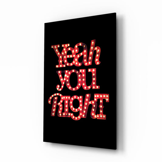 Black glass wall panel with red illuminated marquee-style lettering reading "Yeah You Right" displayed at an angle.
