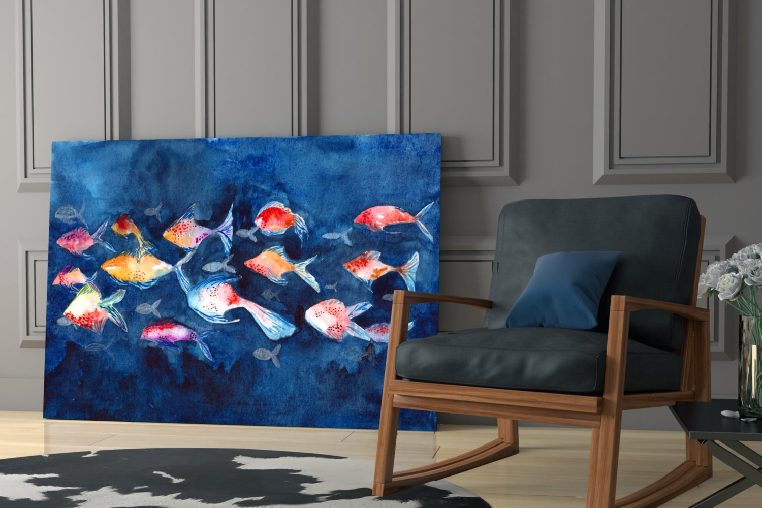 Colorful fish glass wall art in vibrant reds, oranges, and yellows against deep blue background, displayed in modern living room setting next to wooden chair.