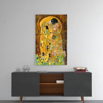 Gustav Klimt's "The Kiss" glass wall art mounted above a mid-century modern console table with geometric decor and stacked books.