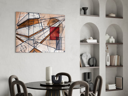 Abstract geometric glass art with orange, tan, blue, and red tones displayed above a dining table in a modern interior setting.