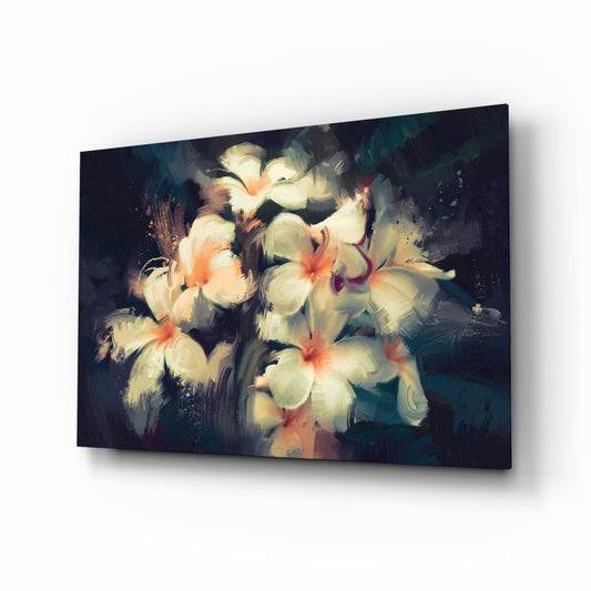 Glass wall art displaying white plumeria flowers with coral centers against dark teal background, photographed at an angle showing depth and shadow.