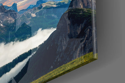Fiery Sunset Clouds Over Rocky Peaks Glass Wall Art