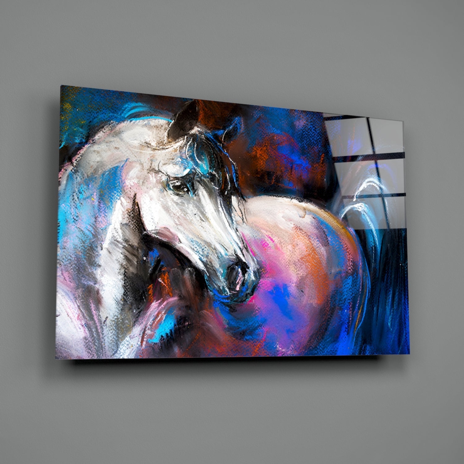 Colorful abstract glass wall art featuring a white horse's head in profile against vibrant blue, purple, and orange brushstrokes, displayed at an angle on gray wall.