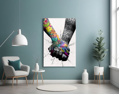 Modern living room interior featuring colorful tattooed hands joined together in glass wall art mounted on teal wall.