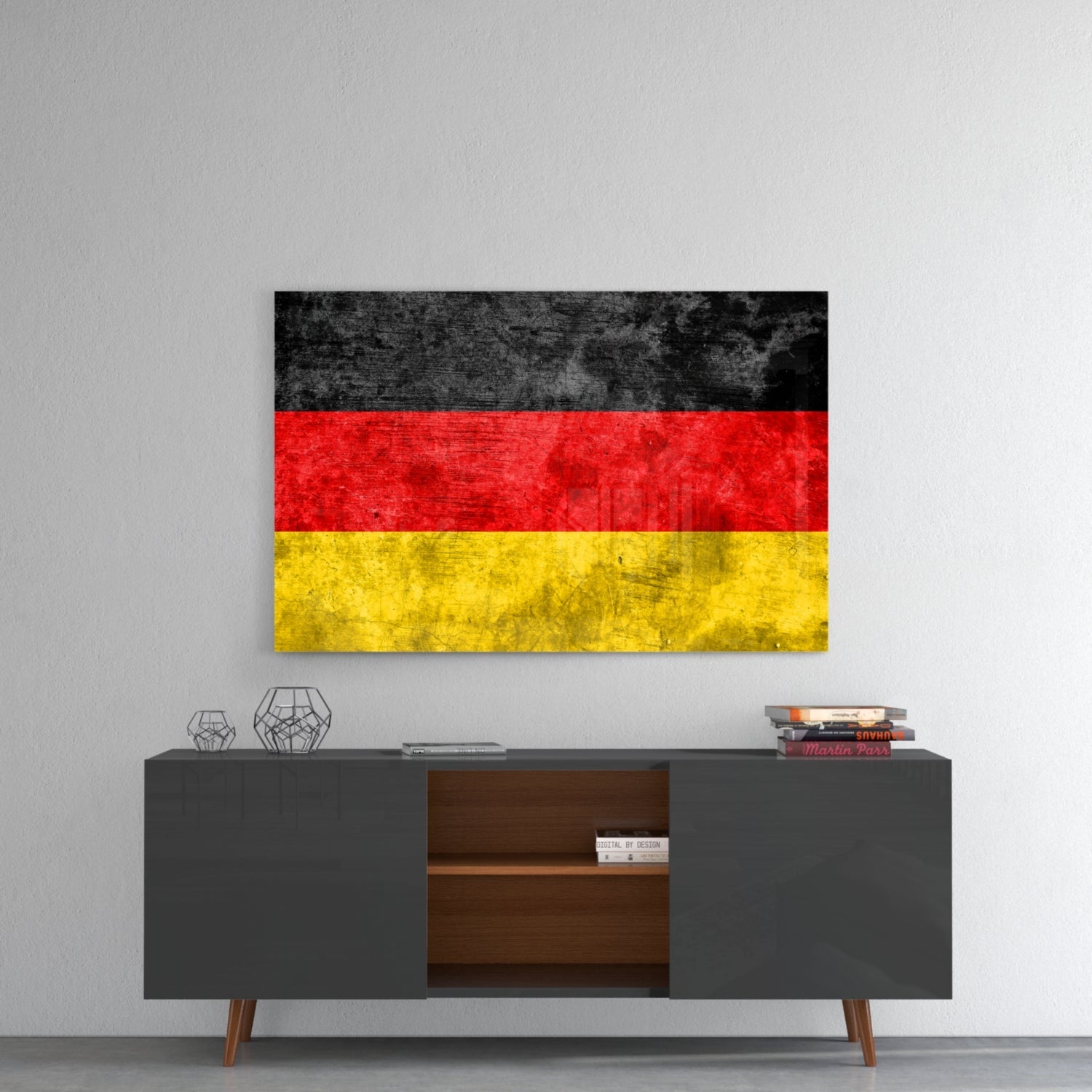 German flag glass wall art with black, red, and yellow horizontal stripes displayed above gray sideboard.